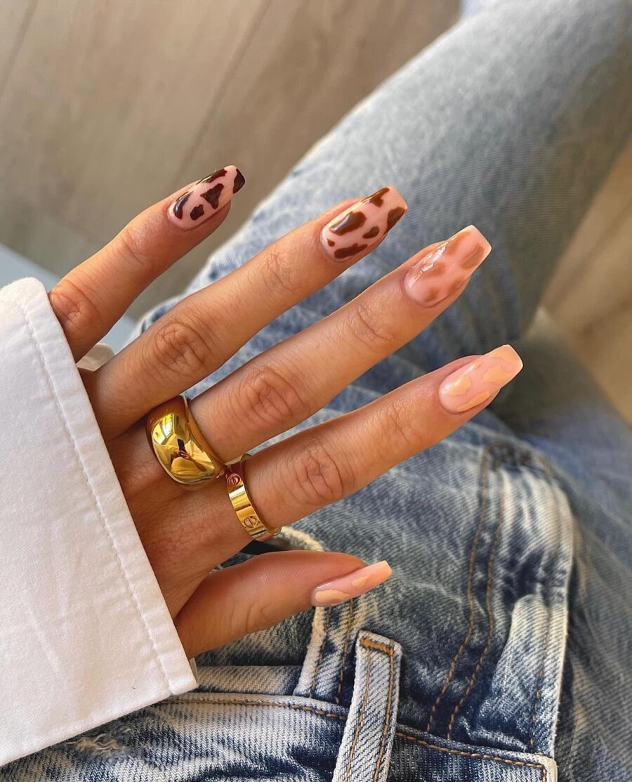 Chic cow print nails for every occasion