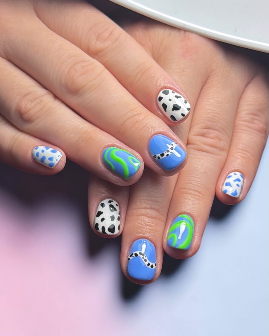 Colorful Cow Print Nail Art Design