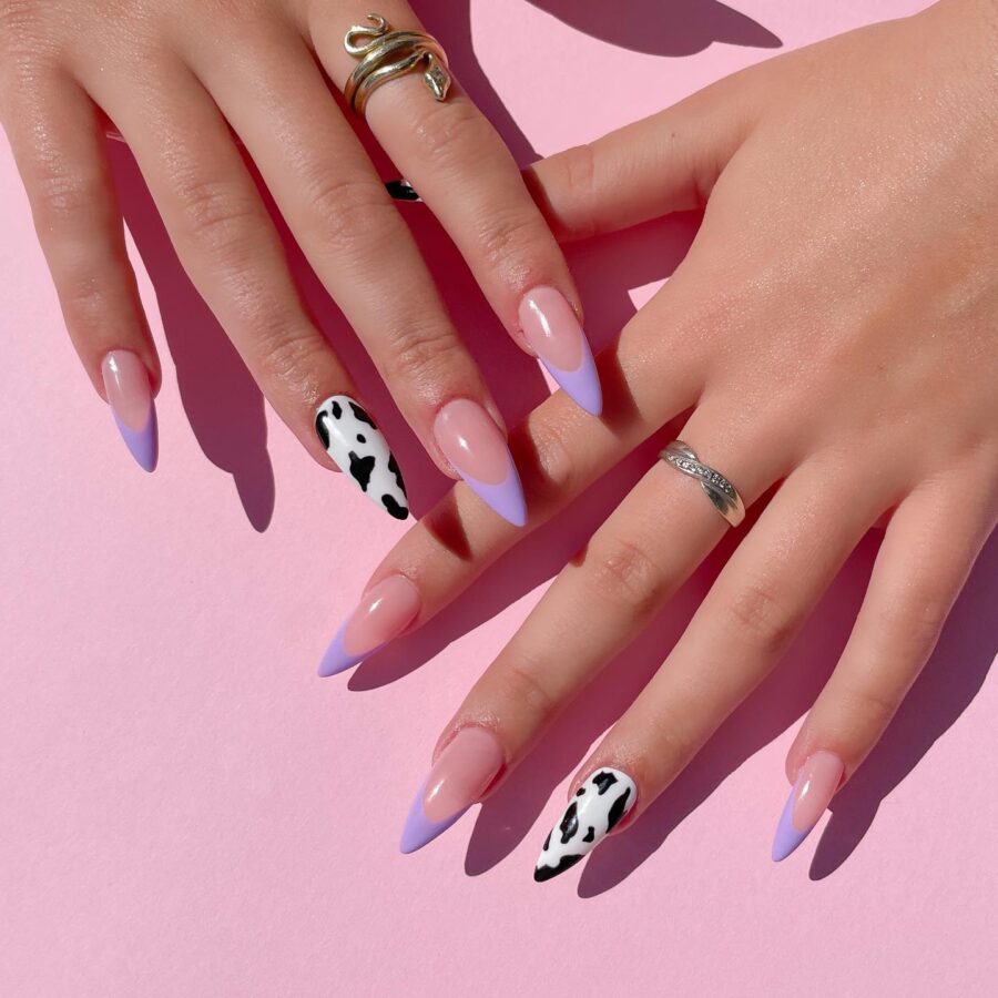 Chic stiletto nails with cow print accents
