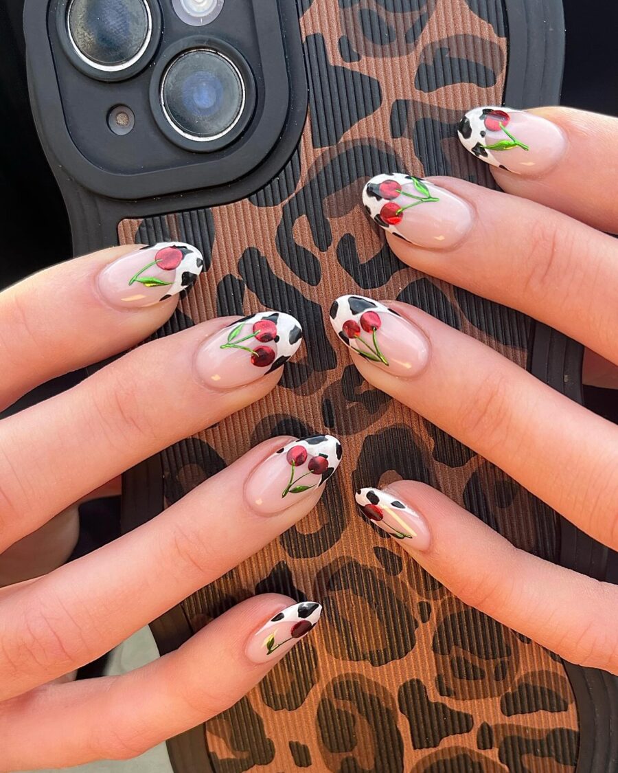 Chic Cow Print Nails with Floral Touch