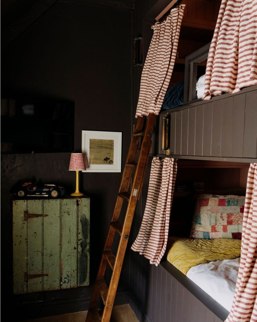 Charming Bunk Bed Nook with Striped Curtains