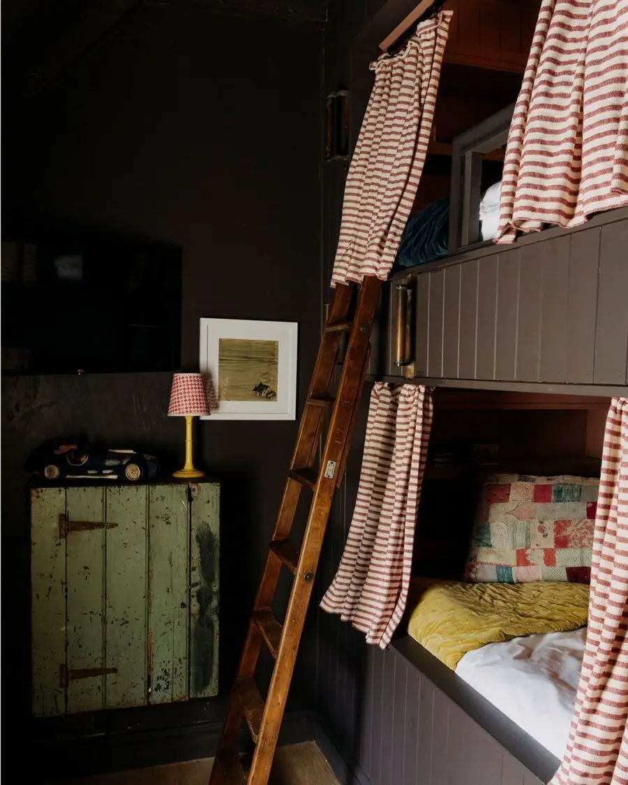 Charming Bunk Bed Nook with Striped Curtains