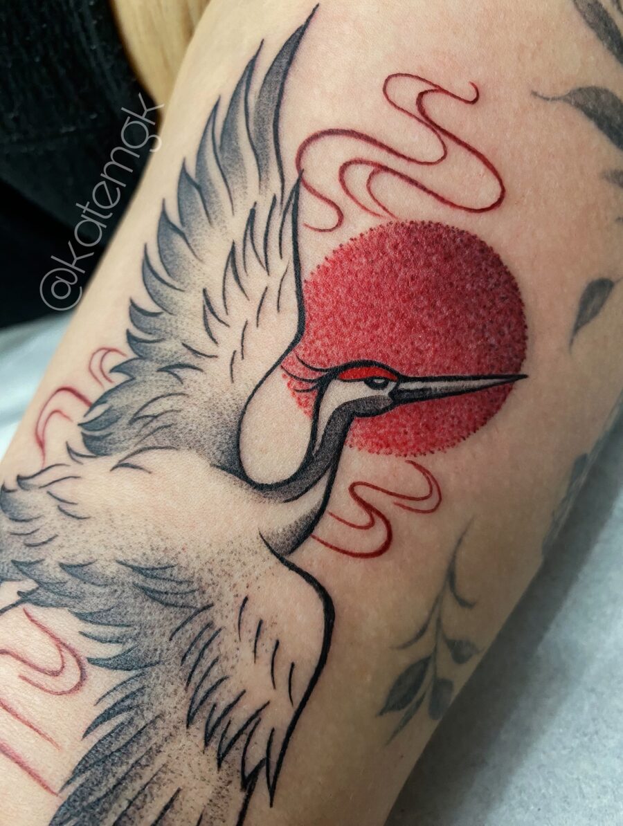Stunning Crane Tattoo with Red Sun Details