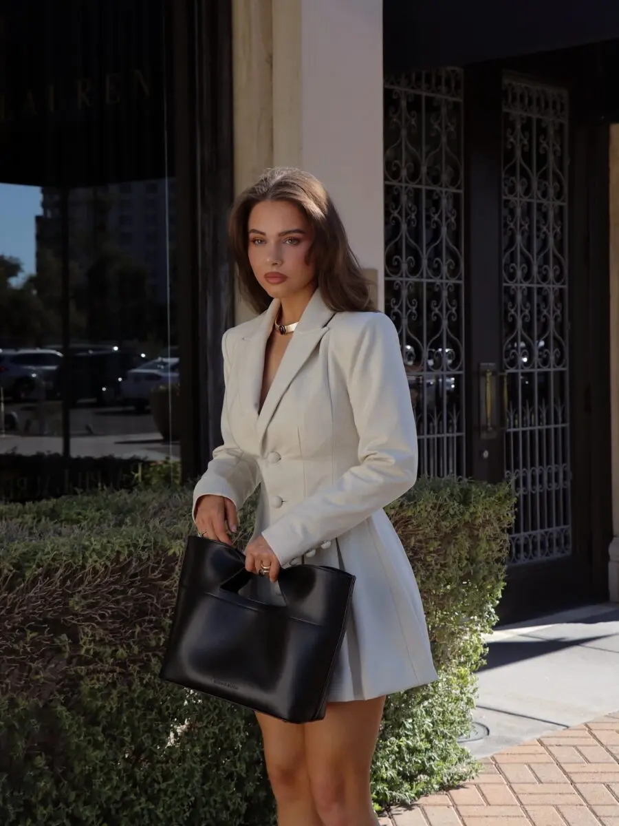 Chic Cream Blazer Dress with Black Accessories