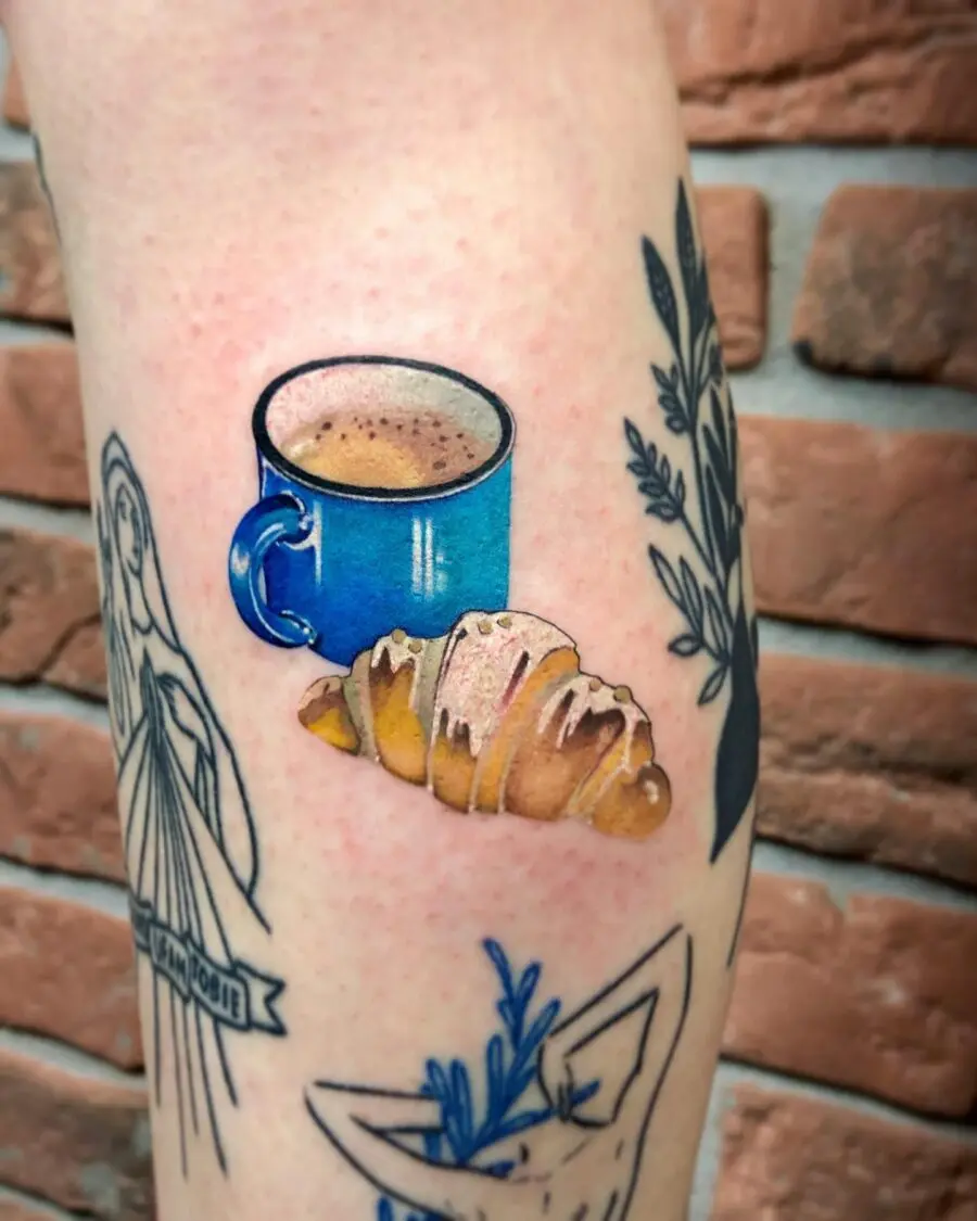 Charming croissant and coffee tattoo design