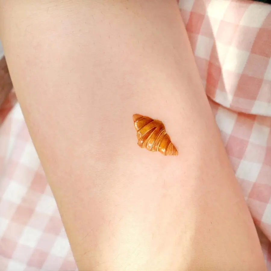 Chic Croissant Tattoo on Skin