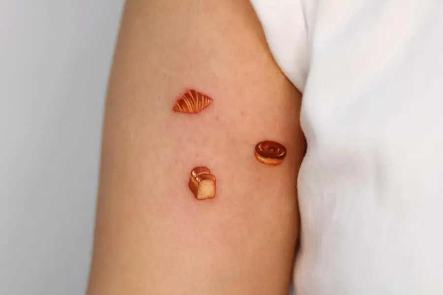 Charming Croissant Tattoos for Food Lovers