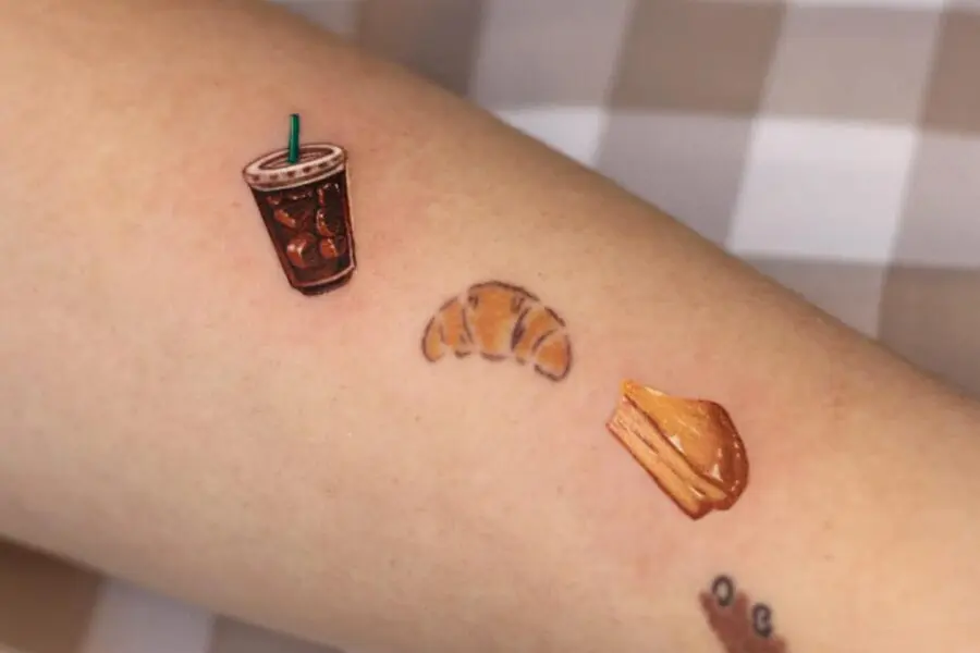 Delightful food-themed croissant tattoos on display