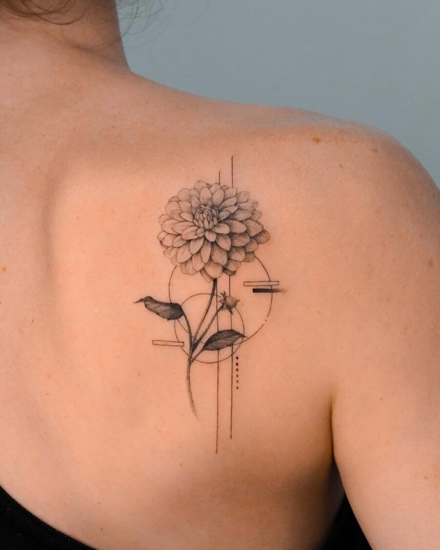 Elegant dahlia tattoo with geometric elements