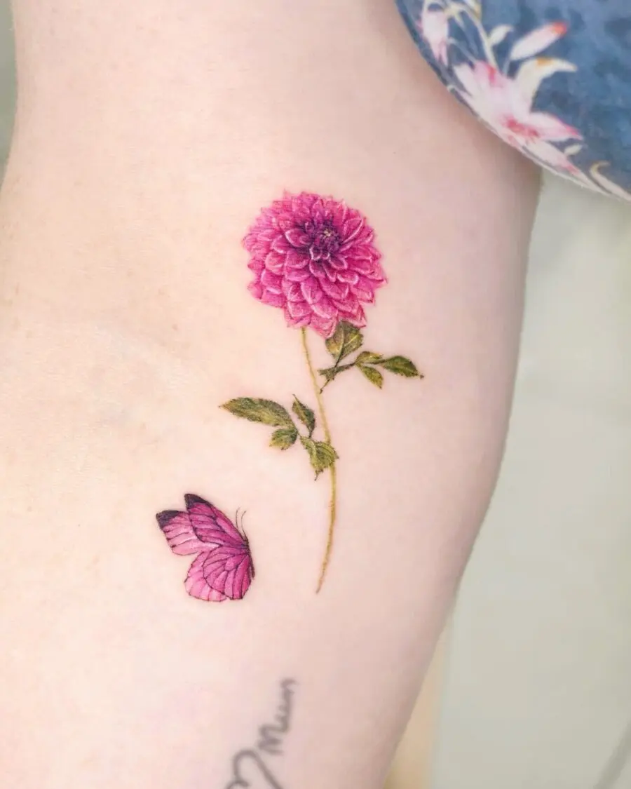 Stunning dahlia tattoo with a butterfly companion