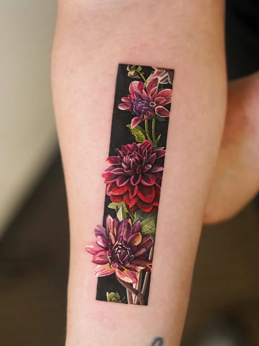 Stunning dahlia tattoo showcasing vibrant flowers