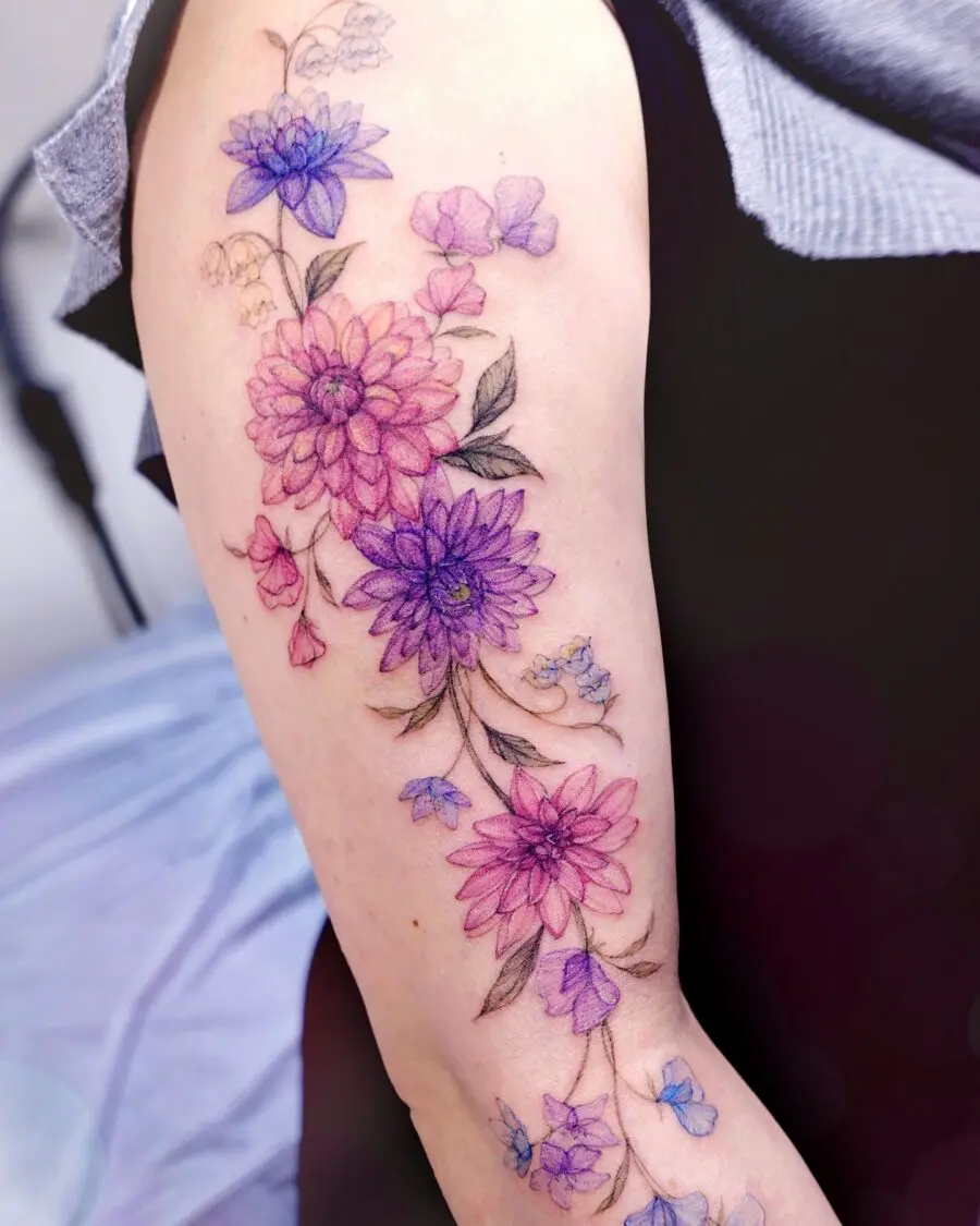 Elegant dahlia tattoo design with soft colors