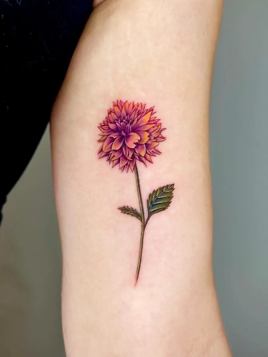 Stunning dahlia tattoo with vibrant colors