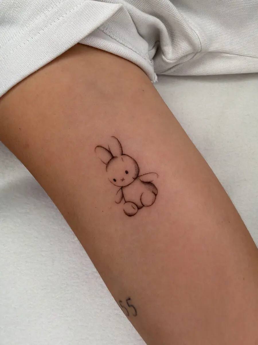Whimsical bunny tattoo for playful vibes