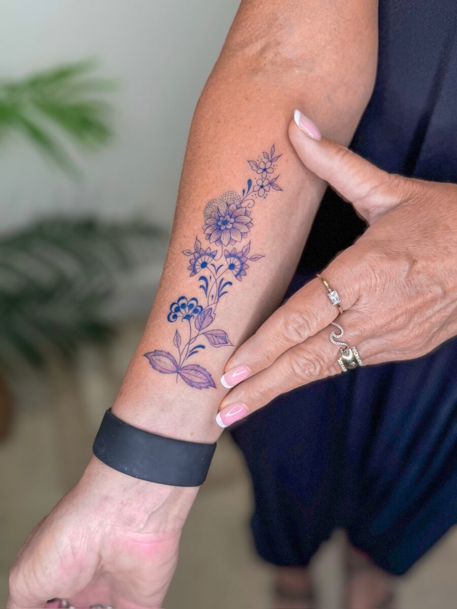 Elegant Floral Tattoo on Forearm