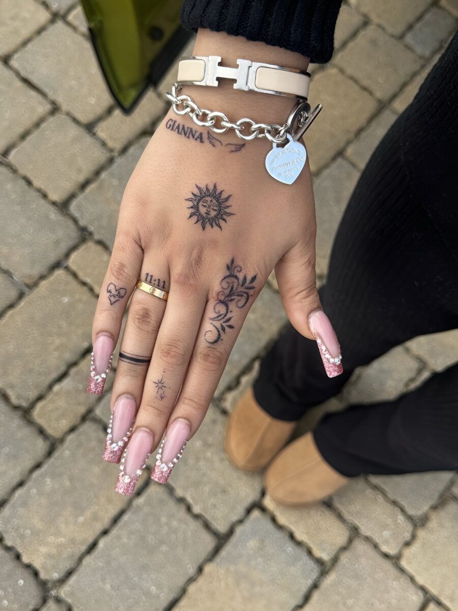 Elegant Dainty Tattoos on a Handsome Hand