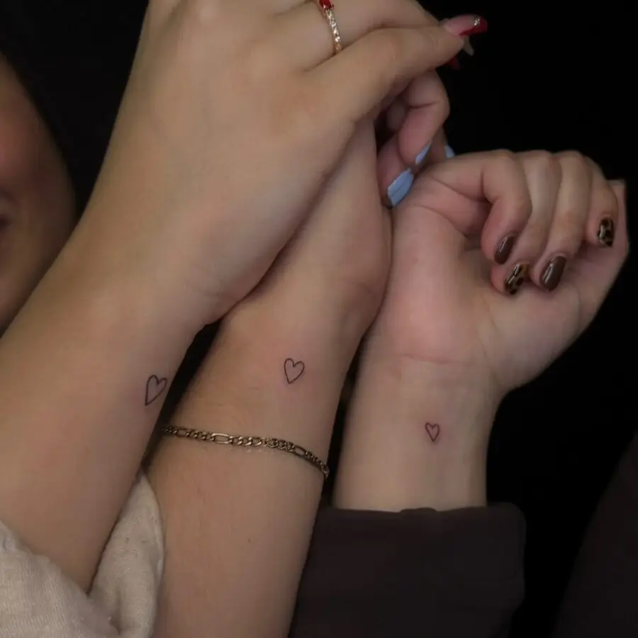 Minimalist heart tattoos for a unique bond