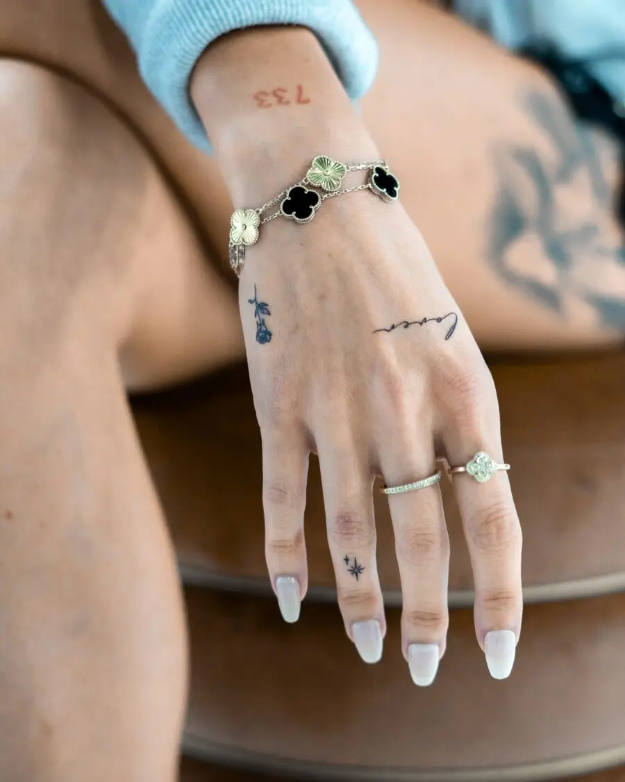 Elegant and delicate dainty tattoos on hand