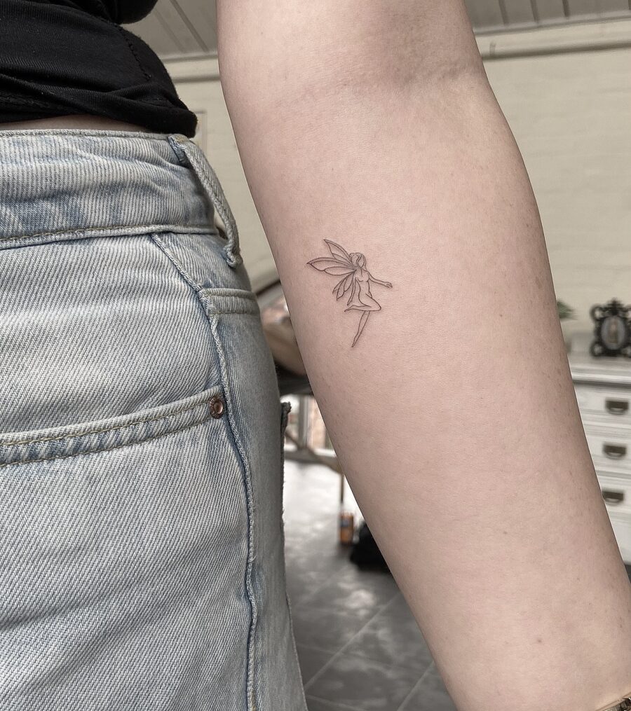 Elegant fairy tattoo on delicate skin