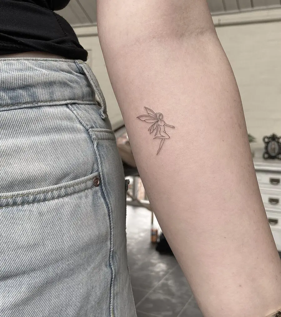 Elegant fairy tattoo on delicate skin