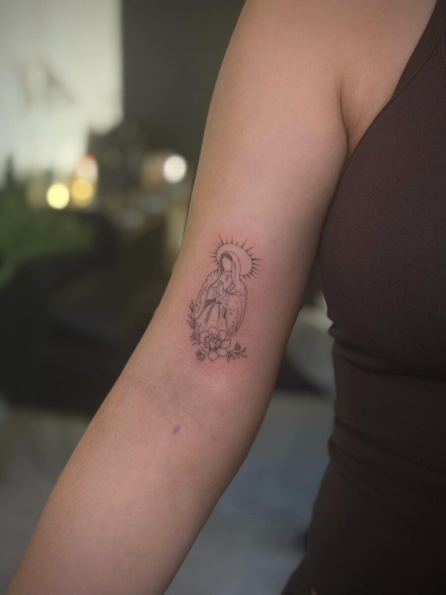 Elegant Dainty Tattoo of a Female Figure