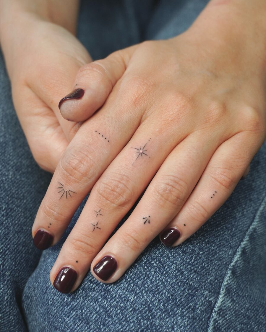 Elegant hand tattoos with minimalist star designs