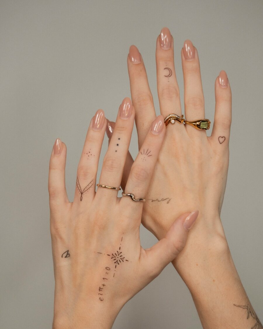 Elegant dainty tattoo designs on hands