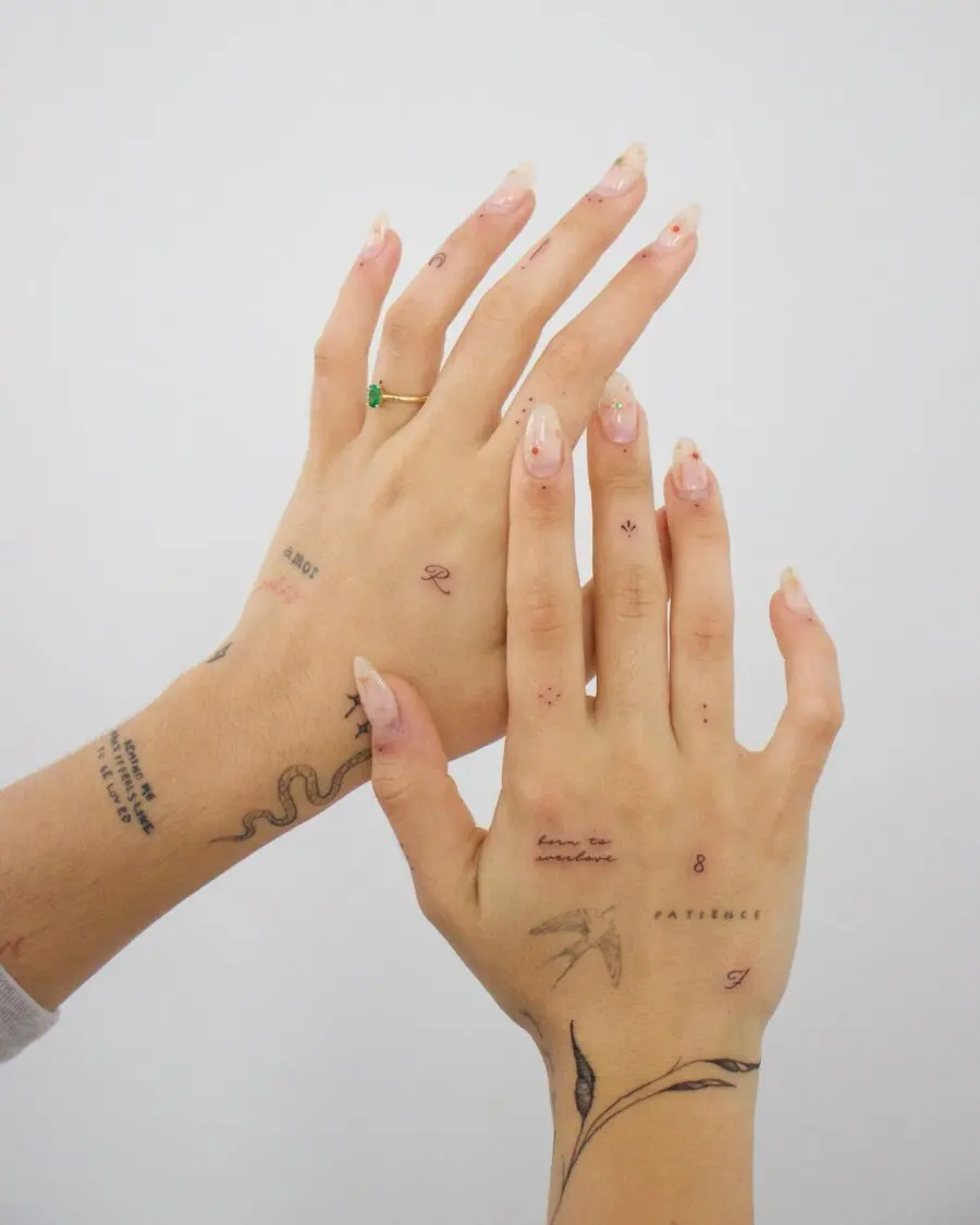 Elegant and subtle hand tattoo designs showcased