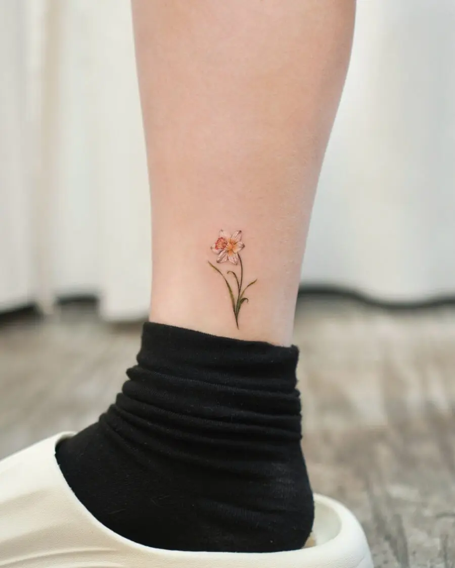 Charming birth flower tattoo on elegant ankle