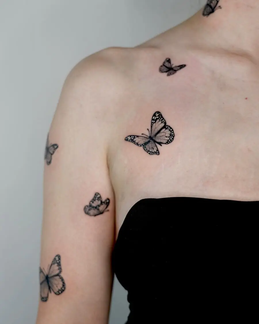 Graceful butterflies adorn this stunning tattoo artwork