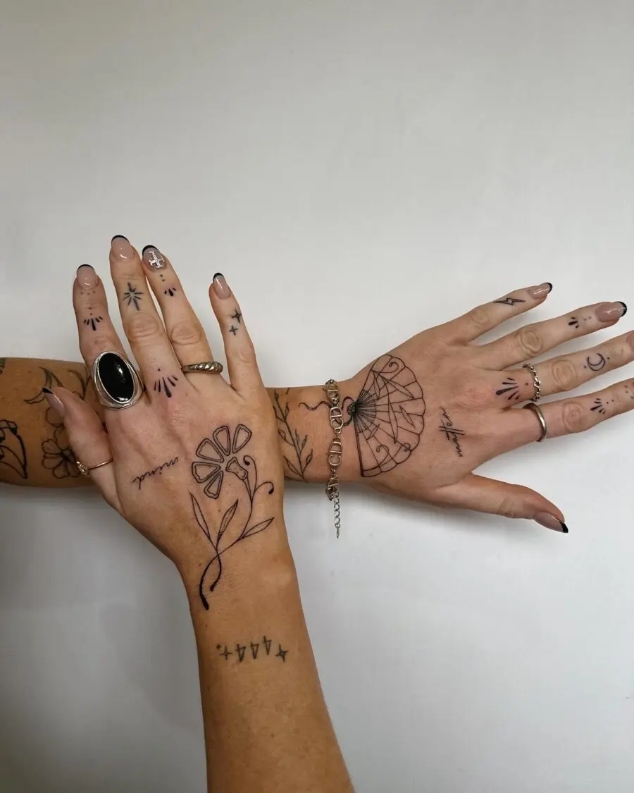 Elegant display of dainty hand tattoos