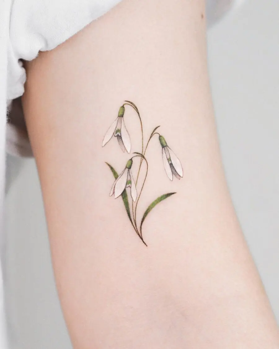 Elegant snowdrop tattoo showcasing soft colors