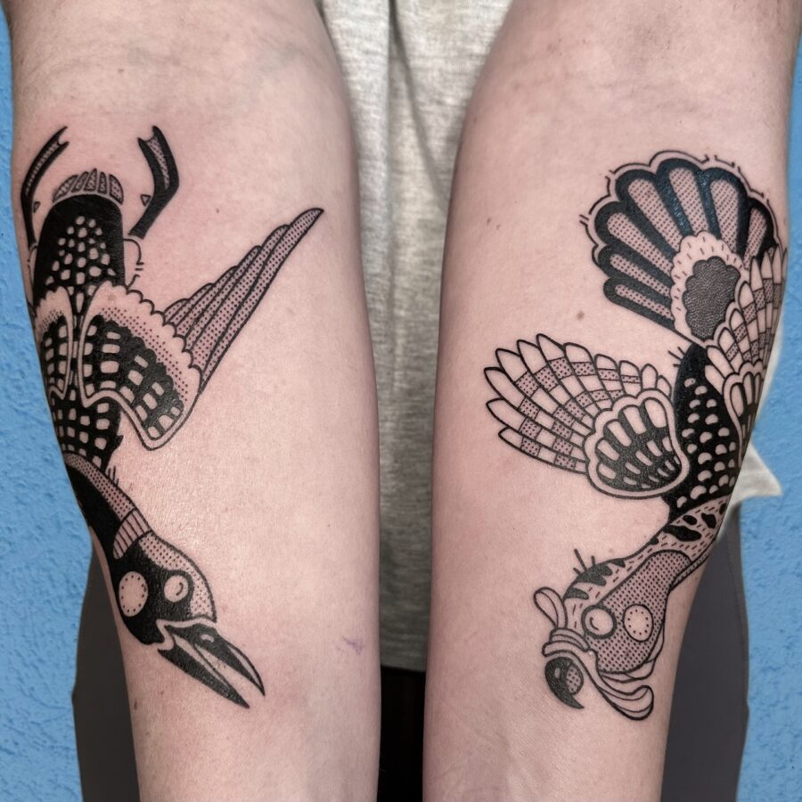 Unique blackwork turkey tattoos on forearms