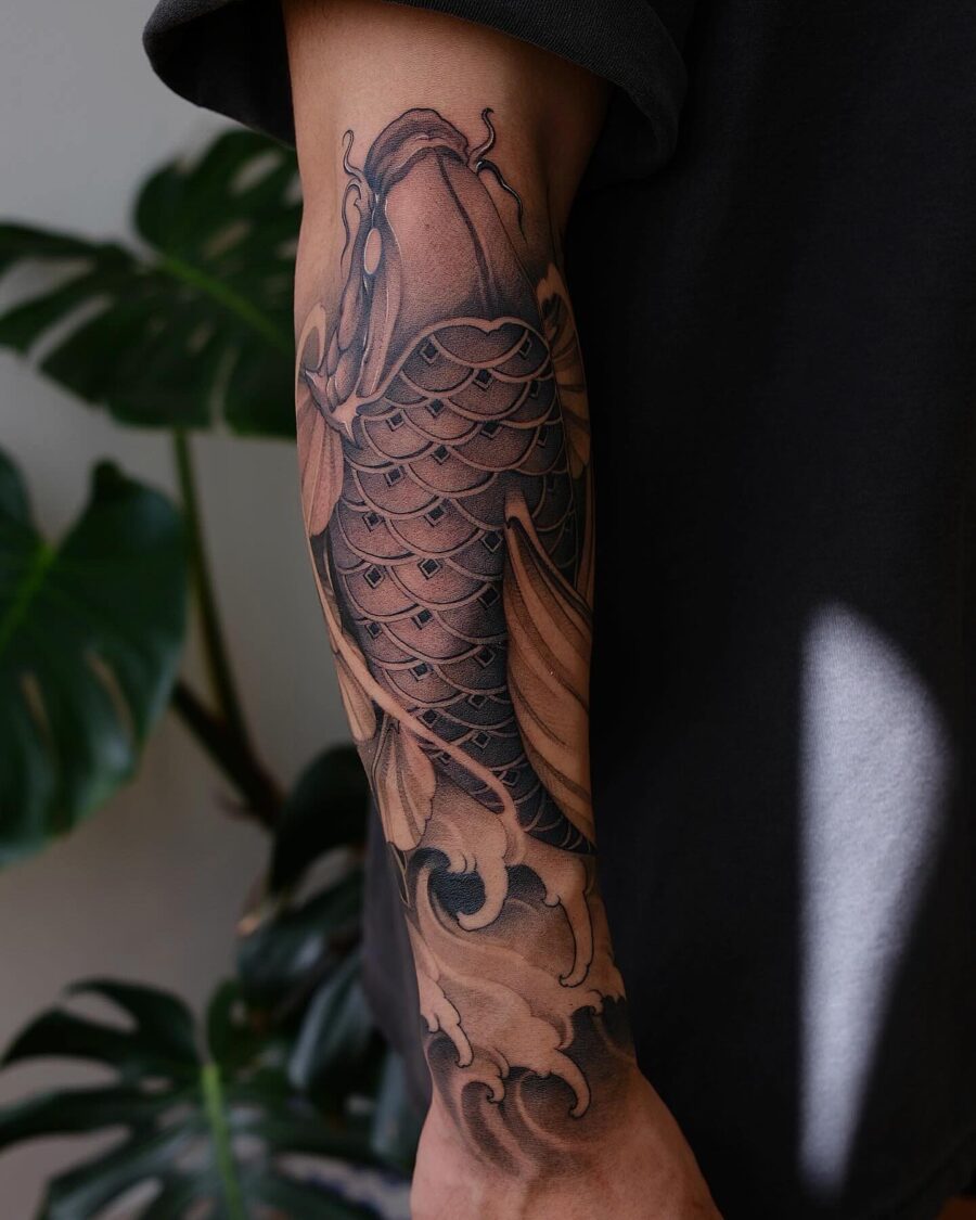 Stunning koi fish half sleeve tattoo design