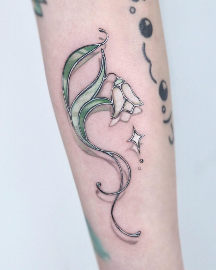Delicate snowdrop tattoo with elegant lines
