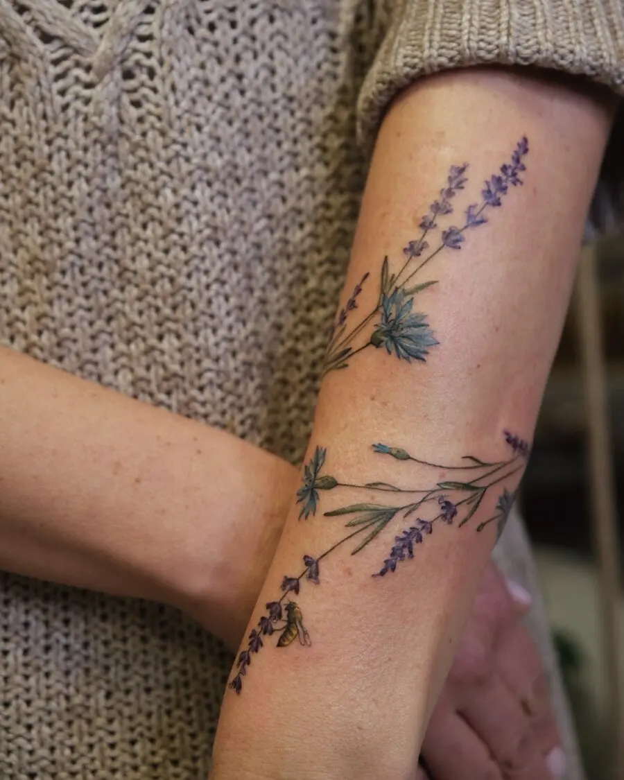 Delicate lavender tattoo on the forearm