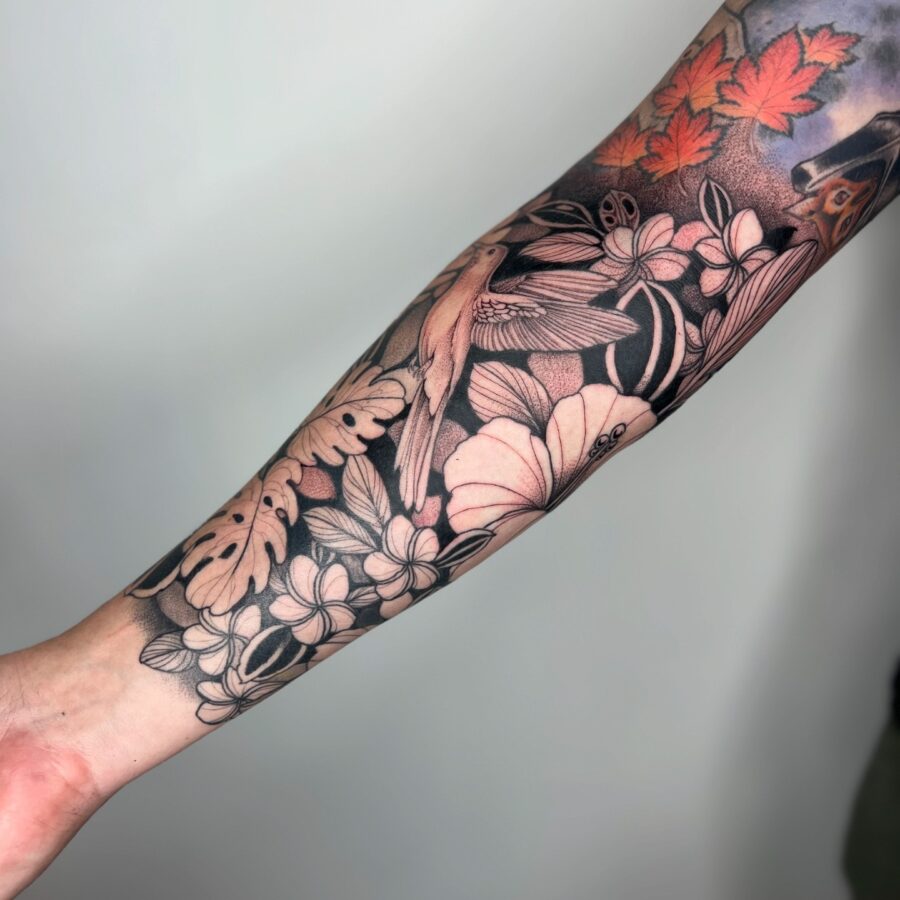 Elegant floral and bird half sleeve tattoo