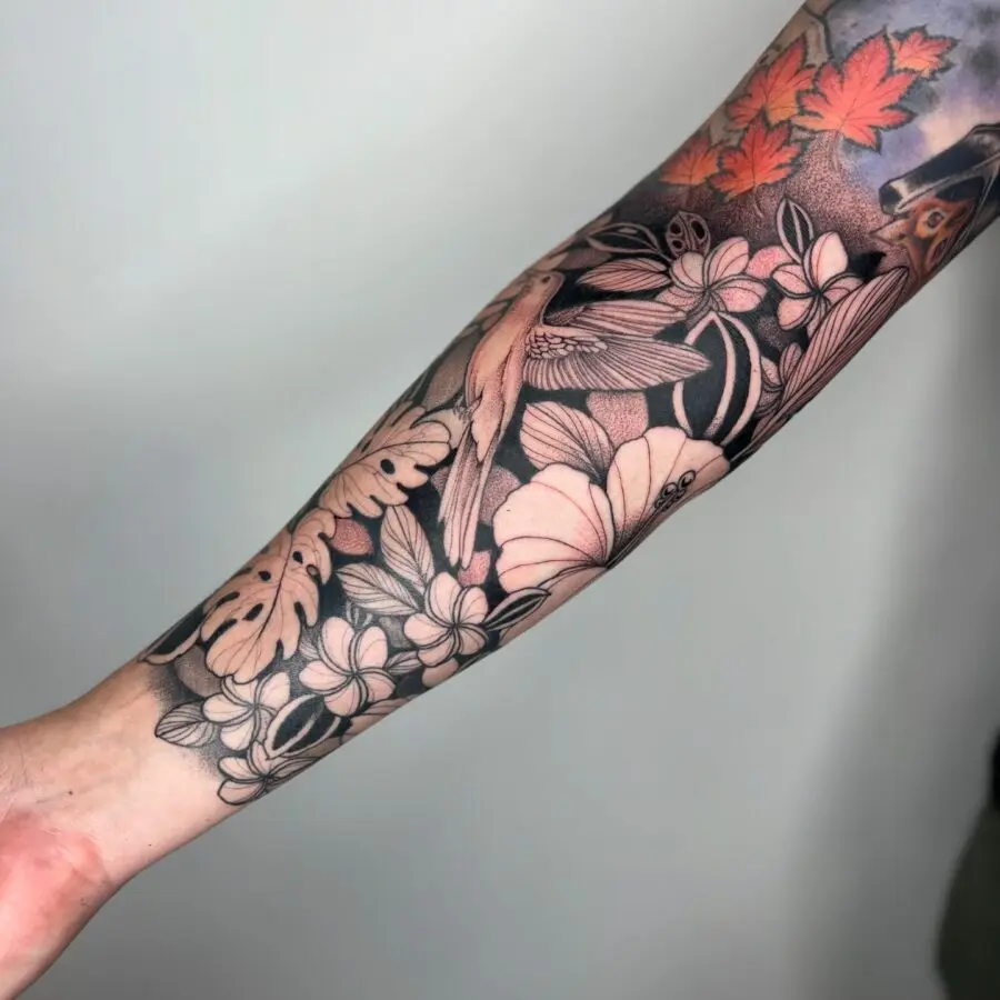 Elegant floral and bird half sleeve tattoo