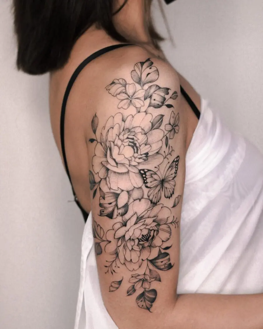 Elegant floral and butterfly half sleeve tattoo