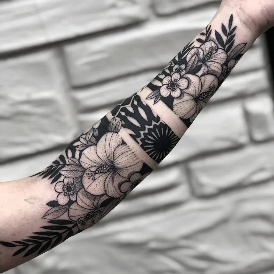 Elegant floral half sleeve tattoo design