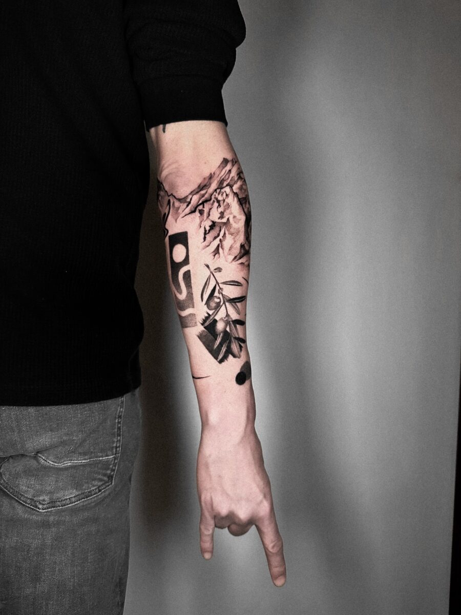 Stunning black and white floral half sleeve tattoo