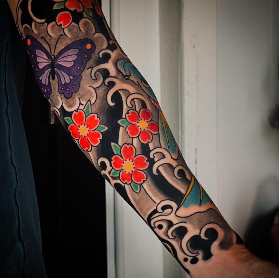 Vibrant Half Sleeve Tattoo Design with Nature Themes