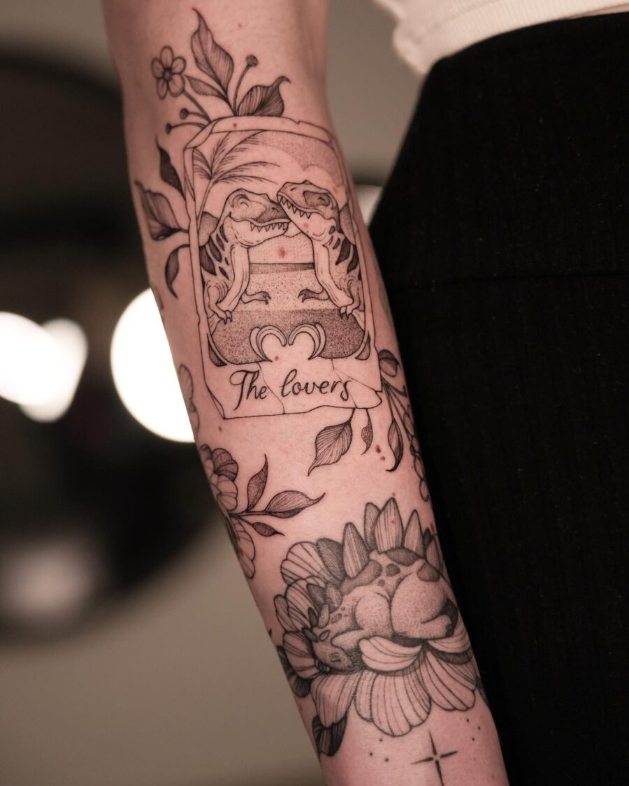 Unique dinosaurs celebrate love in tattoo art