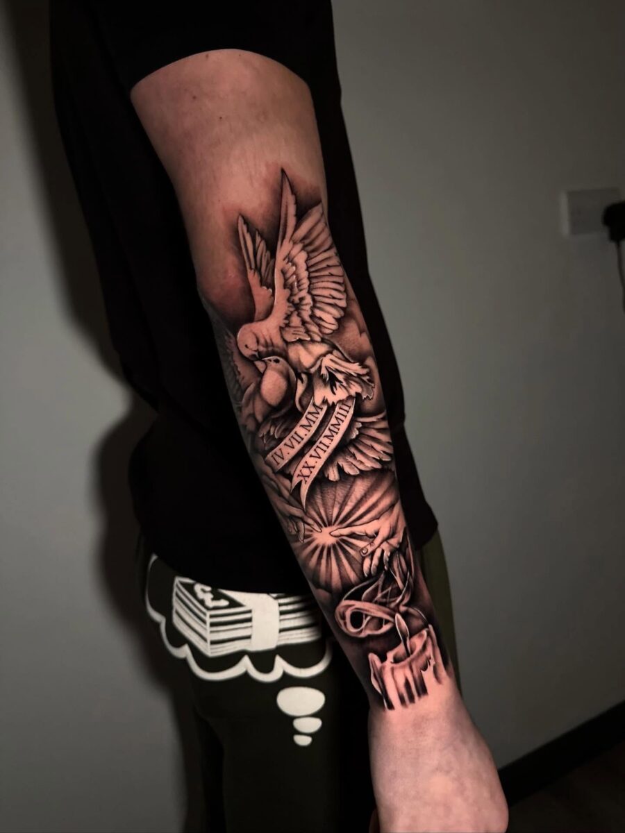 Elegant dove and timepiece half sleeve tattoo