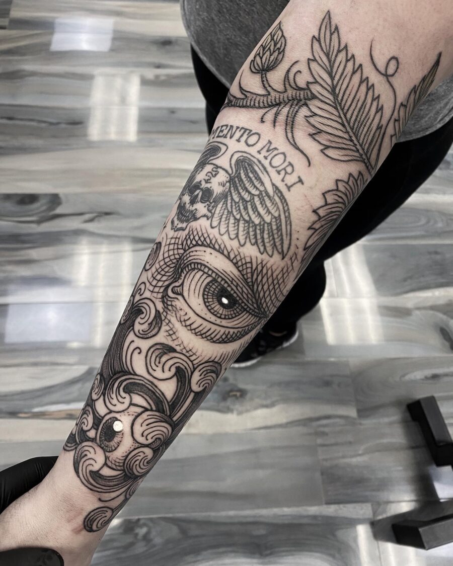 Intricate half sleeve with eye symbolism