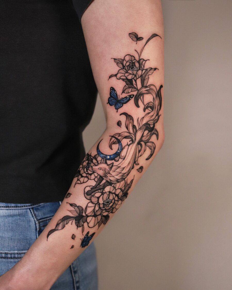 Elegant floral and butterfly half sleeve tattoo
