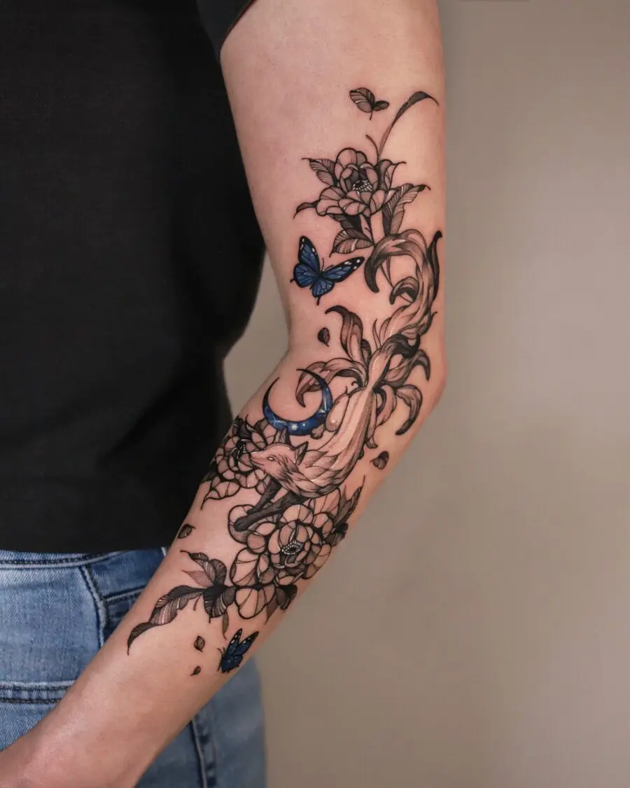 Elegant floral and butterfly half sleeve tattoo