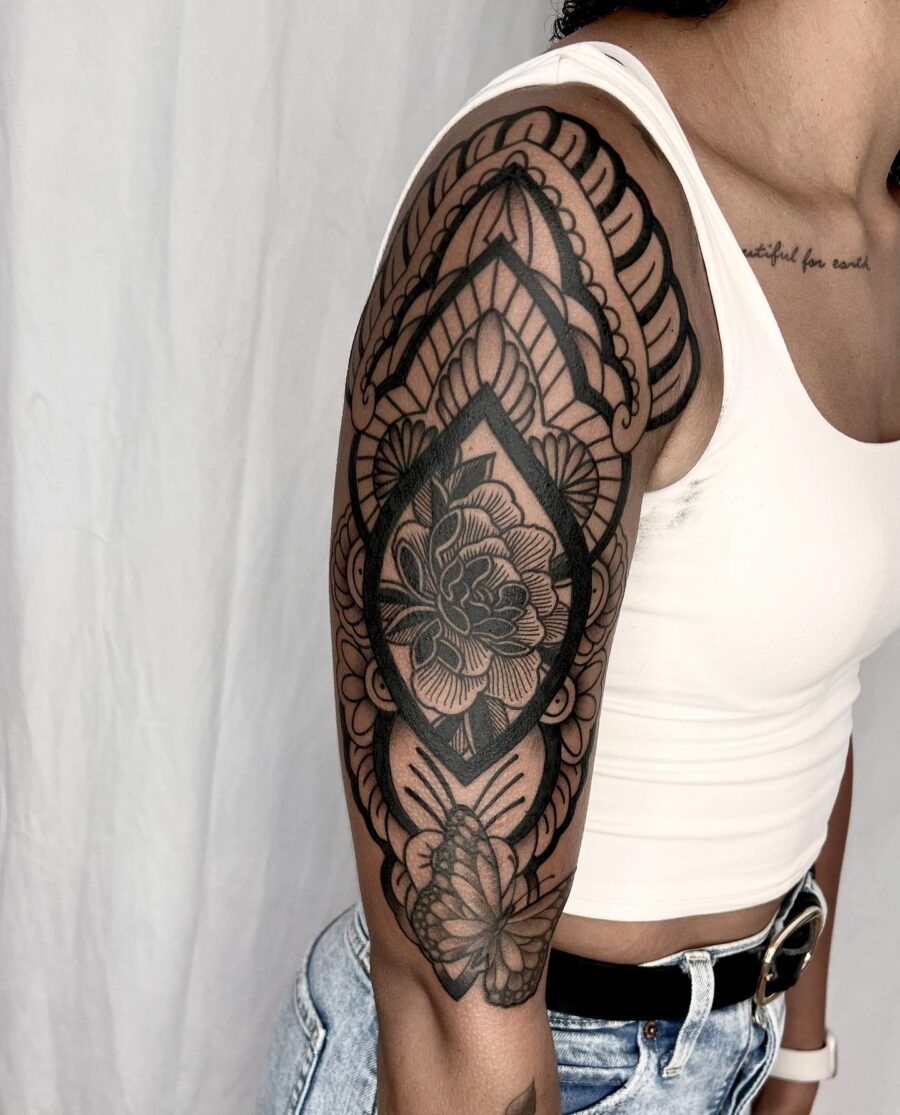Intricate Flower Design Half Sleeve Tattoo