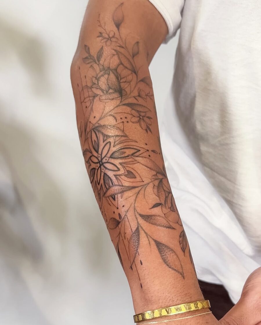 Elegant floral half sleeve tattoo design