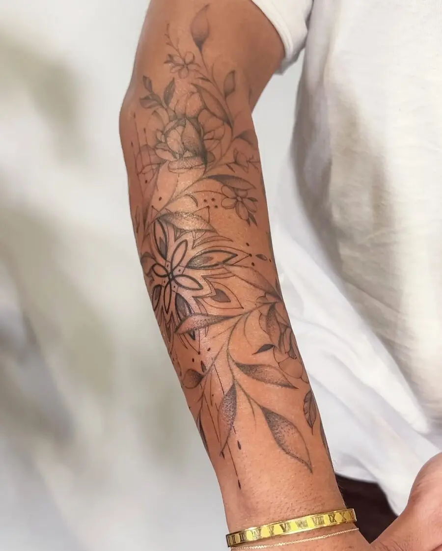 Elegant floral half sleeve tattoo design